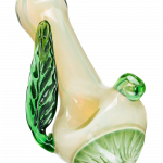 A close-up, angled view of the Leafy Green Mushroom Milli Spoon Pipe, showcasing its green, mushroom-shaped bowl and curved design.
