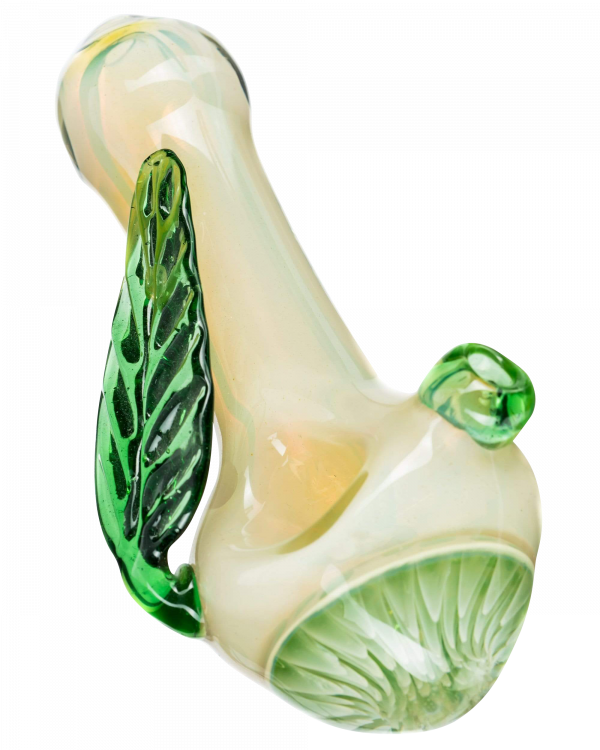 A close-up, angled view of the Leafy Green Mushroom Milli Spoon Pipe, showcasing its green, mushroom-shaped bowl and curved design.