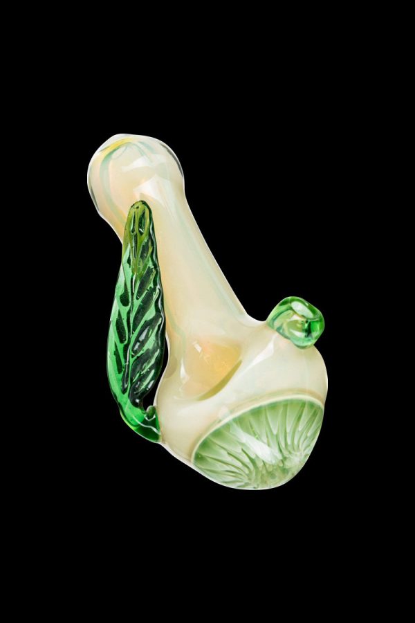 A three-quarter view of the Leafy Green Mushroom Milli Spoon Pipe, showcasing its green, mushroom-shaped bowl and curved design.