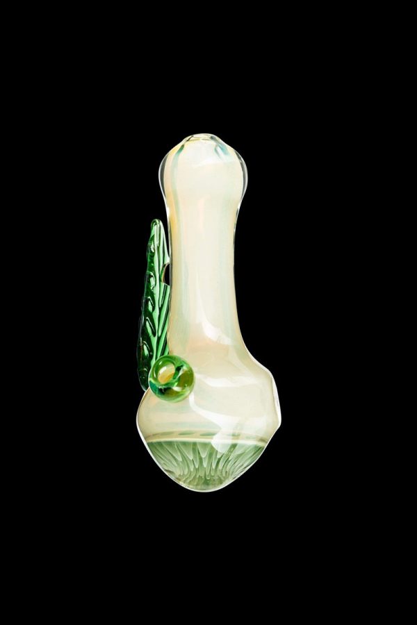 A close-up, angled view of the Leafy Green Mushroom Milli Spoon Pipe, showcasing its smooth, green glass construction.