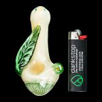 A close-up of the Leafy Green Mushroom Milli Spoon Pipe shows a green, mushroom-shaped glass pipe against a black background.