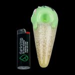 A close-up shows the Single Scoop Ice Cream Spoon Pipe with a glossy finish and curved design, angled against a dark background.