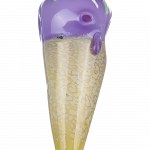 A studio shot of the Single Scoop Ice Cream Spoon Pipe, showcasing its spoon-shaped glass body with a gradient from amber to clear.