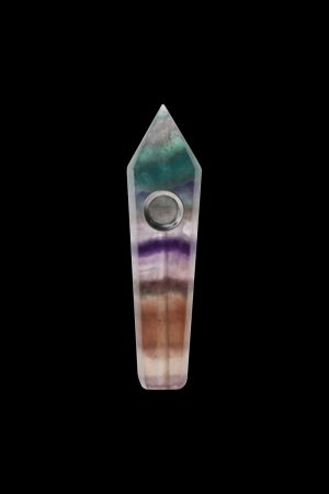 Front view of the Stone Pipe, a slender, textured pipe with a dark background emphasizing its form.