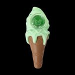 A glass ice cream cone-shaped water pipe with a mint-green “ice cream” top and a brown cone base, isolated on a black background.