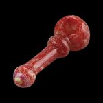 Red glass pipe with marbled pattern against a black background.