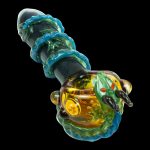 Front view of the Empire Glassworks Dragon Sphere Small Spoon Pipe, showcasing vibrant glass swirls and a detailed dragon orb design.