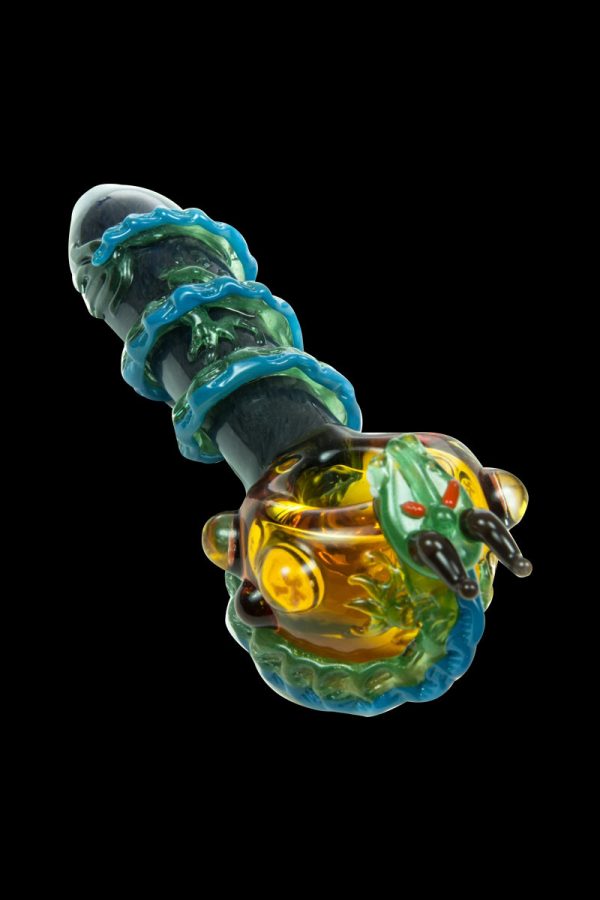 Front view of the Empire Glassworks Dragon Sphere Small Spoon Pipe, showcasing vibrant glass swirls and a detailed dragon orb design.