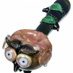 A detailed close-up of the Empire Glassworks "The Owl" Mini Glass Spoon Pipe, showing its sculpted design and dark glass finish.