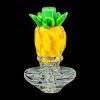 A close-up, angled view of the Pineapple Carb Cap for Puffco Peak, showcasing its textured, translucent glass design.