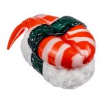 A studio shot of the Empire Glassworks Shrimp Nigiri Sushi Hand Pipe, showcasing its vibrant red and white design resembling sushi.