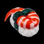 A close-up, angled view of the Empire Glassworks Shrimp Nigiri Sushi Hand Pipe, sculpted to resemble a piece of sushi.