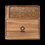 Wooden cannabis rolling tray with a mosaic inlay and branded logo.