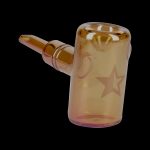 Orange glass bubbler with star designs.