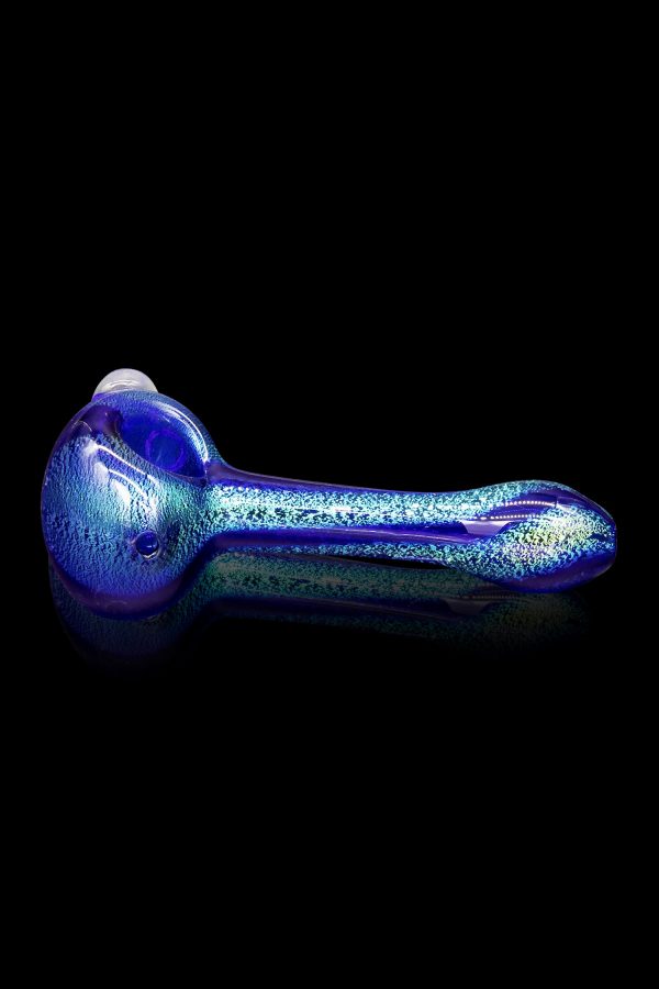 Blue glass pipe with iridescent shimmer, isolated on black.