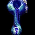 Blue glass cannabis pipe with speckled glitter effect, isolated on black.