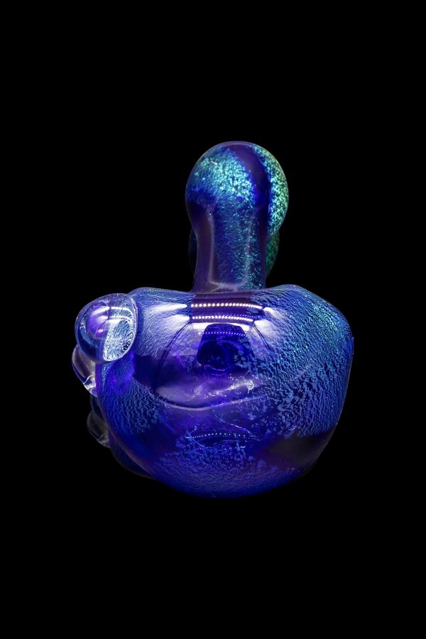 Blue glass cannabis water pipe against a black background.
