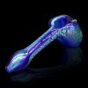 Blue glass pipe with speckled texture, studio shot.