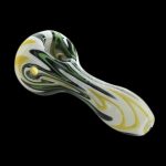 Glass pipe with green and yellow swirls against a black background.
