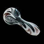 Glass pipe with swirling black, white, and brown patterns against a black background.