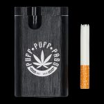 A close-up of the Aluminum Dugout, showing a filled cigarette resting inside its open compartment.