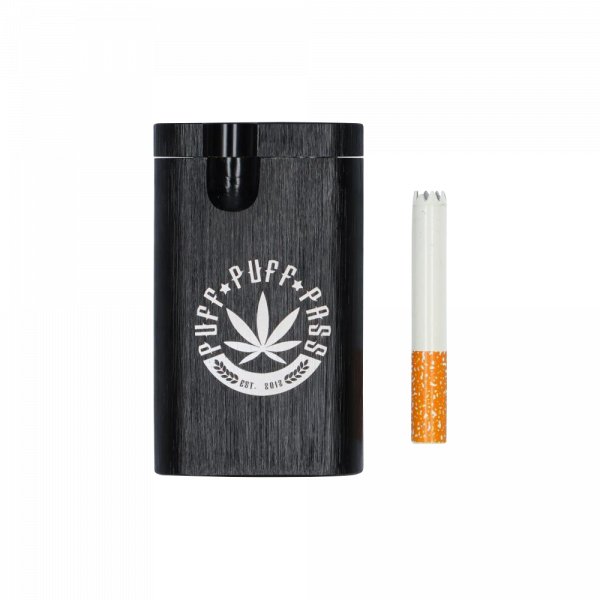 A close-up shot of the Aluminum Dugout, showing a one-piece metal container with a visible cigarette resting inside.