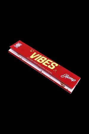 A close-up shot of VIBES King Size Slim Rolling Papers packaging on a white background.