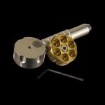 Gold cannabis pipe with tool.