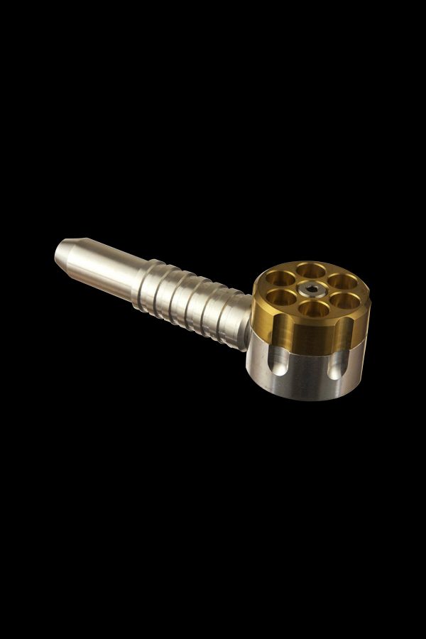 Gold-colored metal oil burner pipe for cannabis concentrates on a black background.