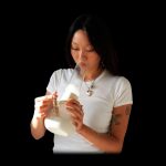 Woman using a water pipe.