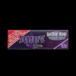 A close-up of the colorful packaging for Juicy Jay's Classic Size Flavored Rolling Papers, displaying a bright, patterned design.