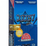 A close-up, slightly angled view of the colorful packaging for Juicy Jay's Classic Size Flavored Rolling Papers, displaying bold branding.