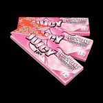 Front view of a pack of Juicy Jay's Classic Size Flavored Rolling Papers with a vibrant, colorful design.