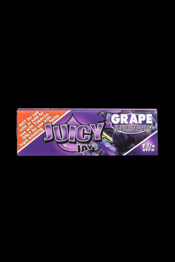 A close-up, angled view of Juicy Jay's Classic Size Flavored Rolling Papers packaging with a grape-themed design.