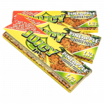 A close-up of the package for Juicy Jay's Classic Size Flavored Rolling Papers, displaying colorful branding and a top-down view.