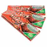 A close-up, angled view of a pack of Juicy Jay's Classic Size Flavored Rolling Papers displaying colorful fruit-themed branding.