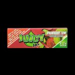 A close-up of the colorful packaging for Juicy Jay's Classic Size Flavored Rolling Papers, angled slightly from above.
