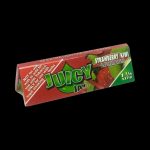 A close-up of the Juicy Jay's Strawberry and Kiwi Rolling Papers package, displaying vibrant fruit graphics on a black background.