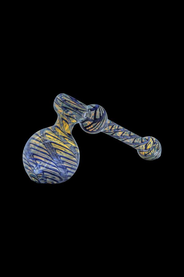 Hand-blown glass pipe with swirling yellow and blue patterns.