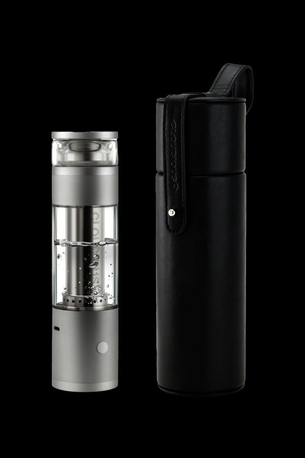 Silver and black cannabis e-rig with a carrying case, studio shot on a black background.