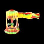 A close-up shot of the Clobb 4 in 1 Silicone Pipe, showcasing its textured, multi-colored design against a dark background.