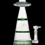 Green and clear glass water pipe shaped like a UFO with a glass bowl attachment.