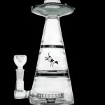 Glass water pipe shaped like a UFO with a cow graphic.