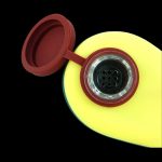 Yellow silicone cannabis container with red lid, displaying a perforated insert.