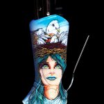 Lighter sleeve featuring a painted portrait of a woman with a dove and mountain scene, designed for a cannabis lighter.