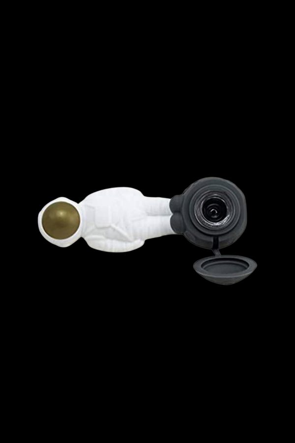 Cannabis oil tincture bottle with dropper against a black background.