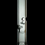 Clear glass smoking tube with bubbler design against a black background.