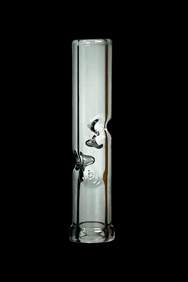 Clear glass smoking tube with bubbler design against a black background.
