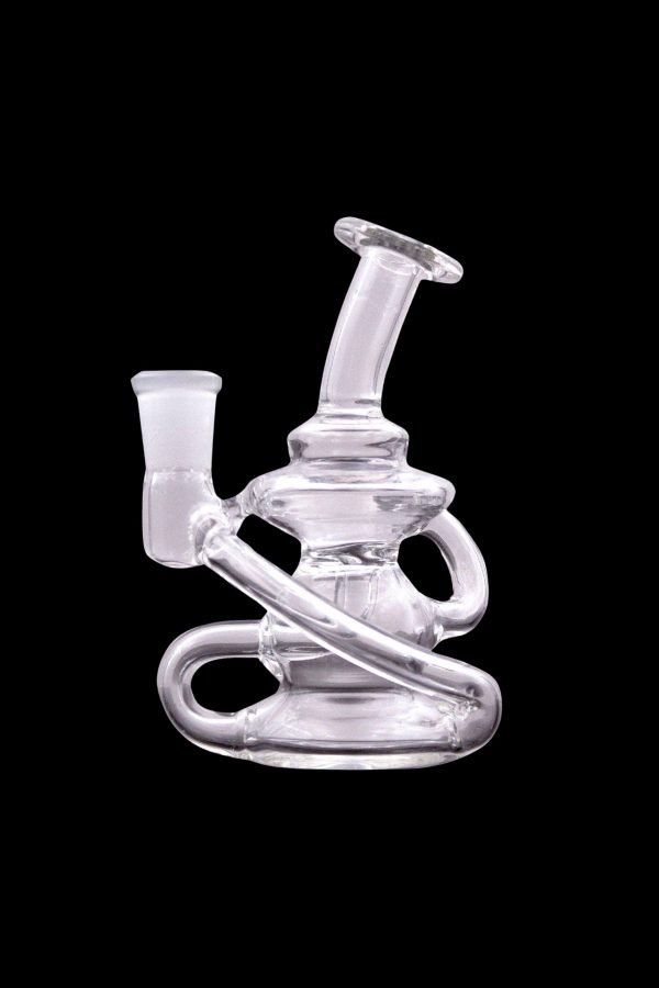 Clear glass water pipe (rig) with intricate looping design, isolated on a black background.
