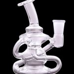 Clear glass water pipe (rig) with intricate looped design.